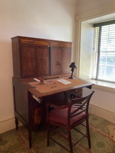 Located in the Game room of the Mount Vernon Hotel Museum, this writing desk would have provided guests with ample space to write letters, draft documents, or perhaps make entries in their own diaries